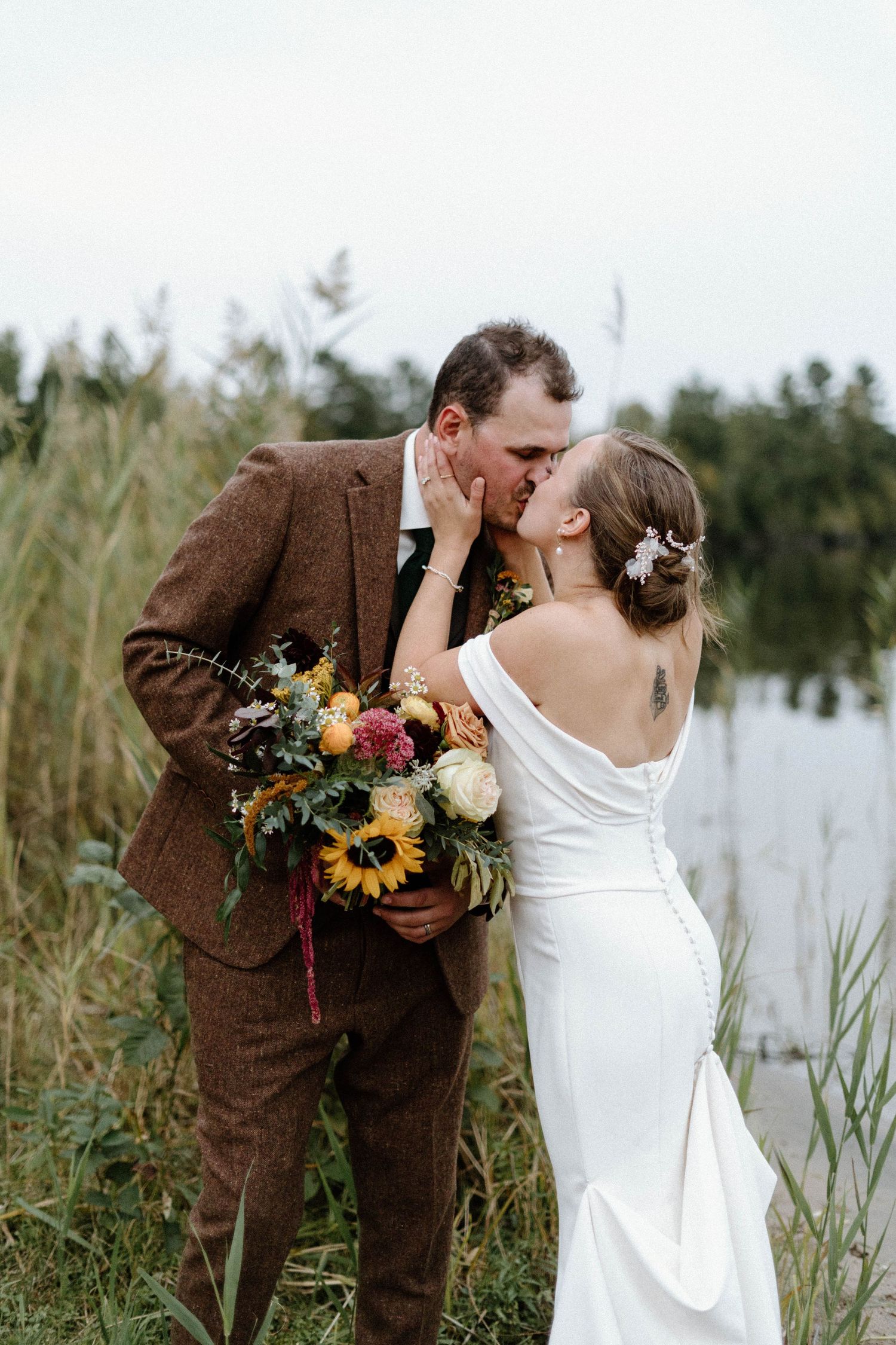 Bride embracing groom for an intimate moment- Alexis Anne Photography-Muskoka Wedding Photographer