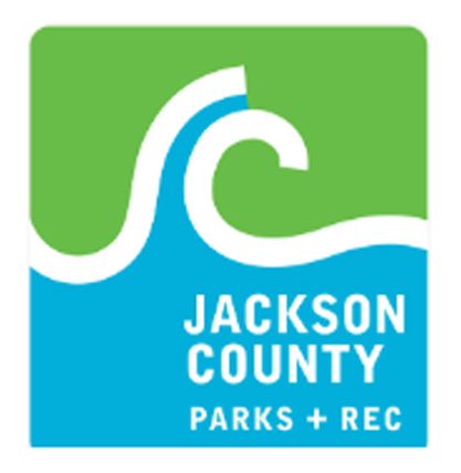 Jackson County Parks and Recreation logo featuring a blue wave design on green background.