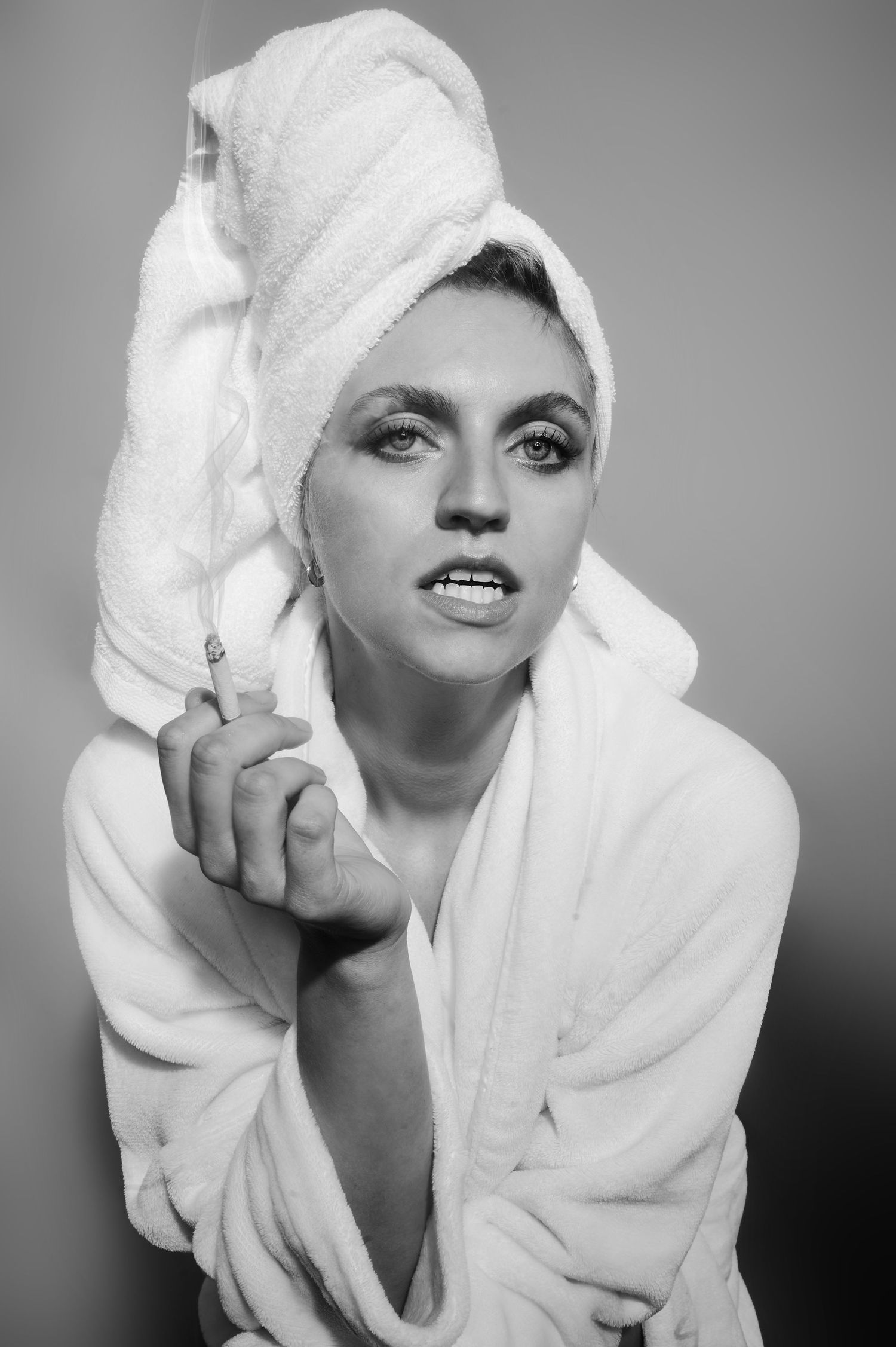 Classic black and white portrait with white towel and robe.