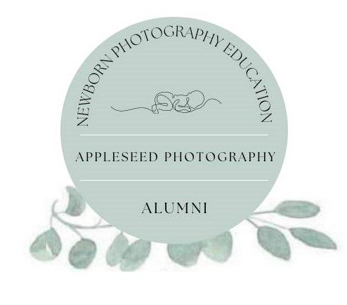 Minimalist newborn photography logo with baby sketch and leaf motifs in sage green.