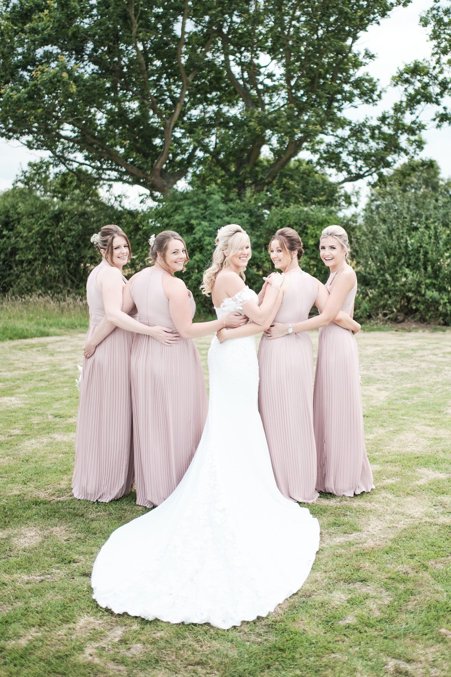Frasers wedding venue in Kent. Bride with her bridesmaids