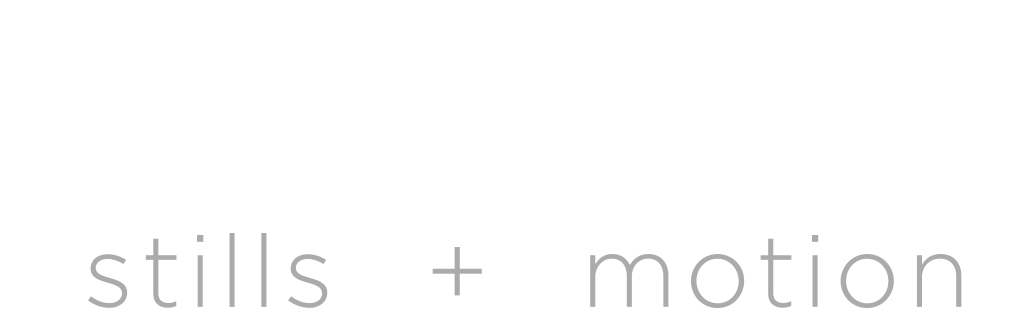 White text logo spelling out TANDEM with 'stills + motion' tagline on black background.