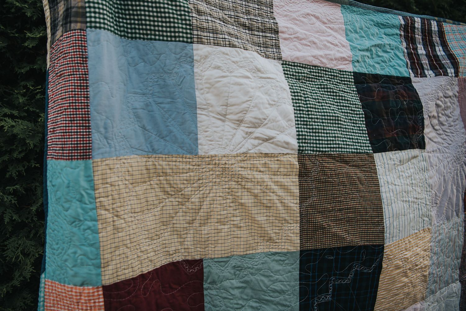 Dress motion quilt stitching showing a flower.