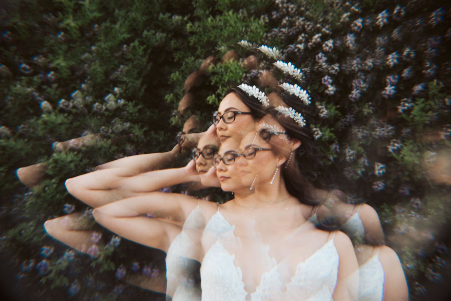 Artistic double exposure portrait of a bride in white dress with sunlight and bubbles.