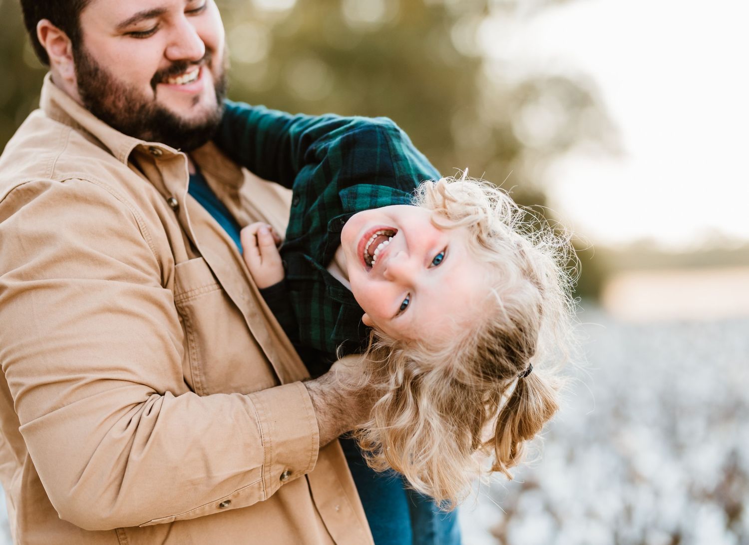 Playful winter family photo session with warm tones and natural expressions.