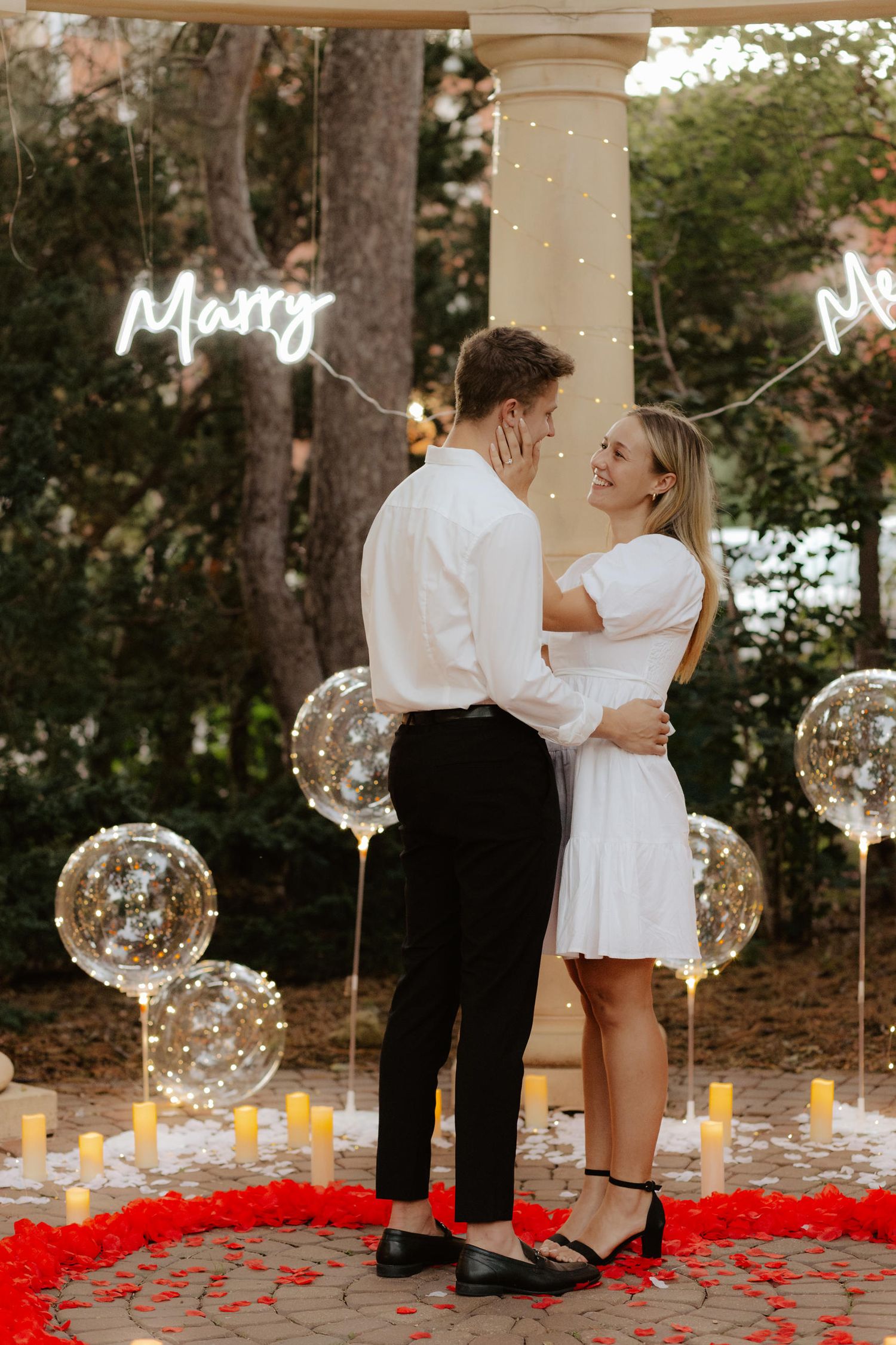 Romantic candlelight proposal at Hazel Abel Park in Lincoln, NE. The perfect intimate setting for a surprise engagement!