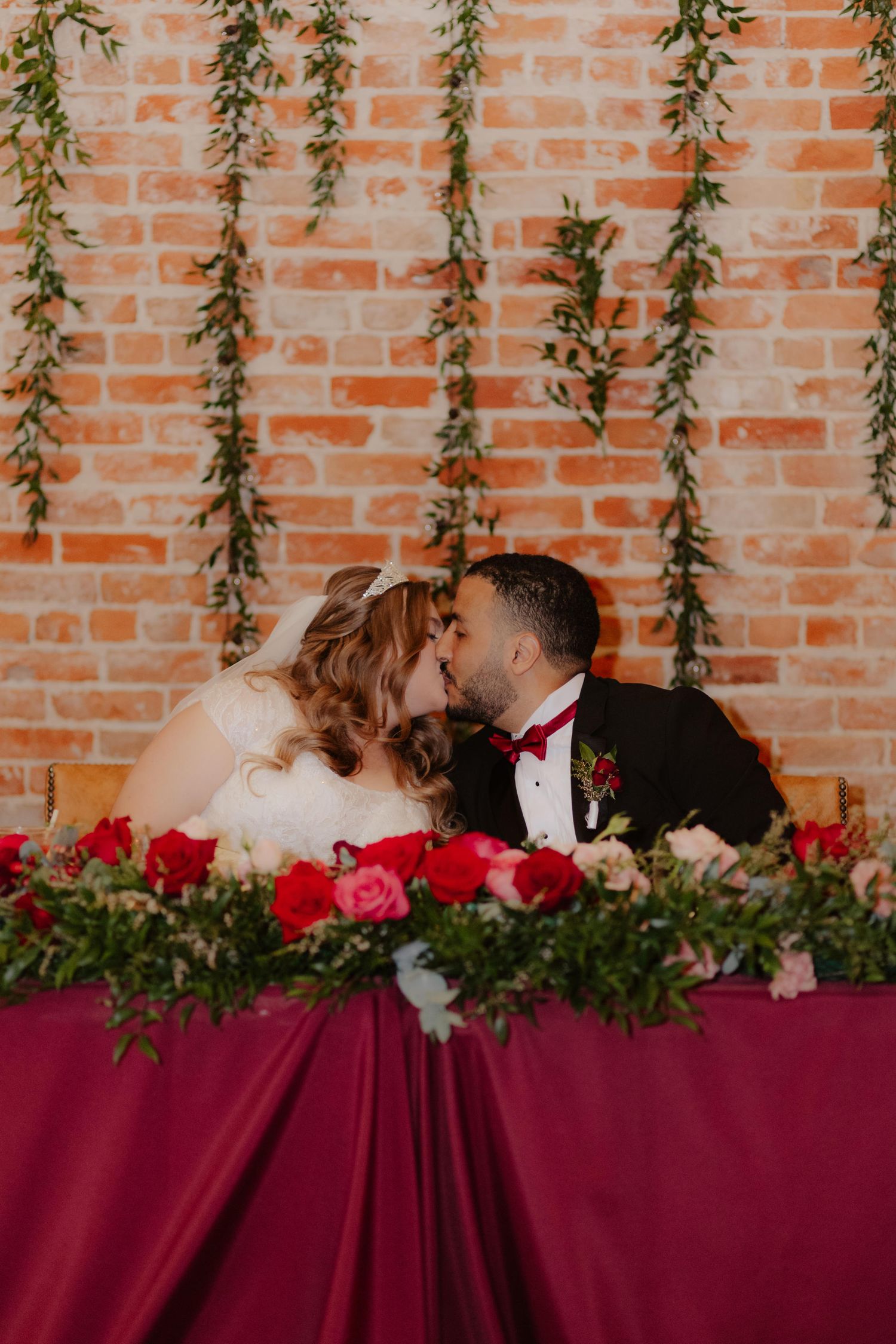 Elegant wedding reception at The 1206 in Crete, Nebraska, with glowing lights and joyful guests celebrating the newlyweds