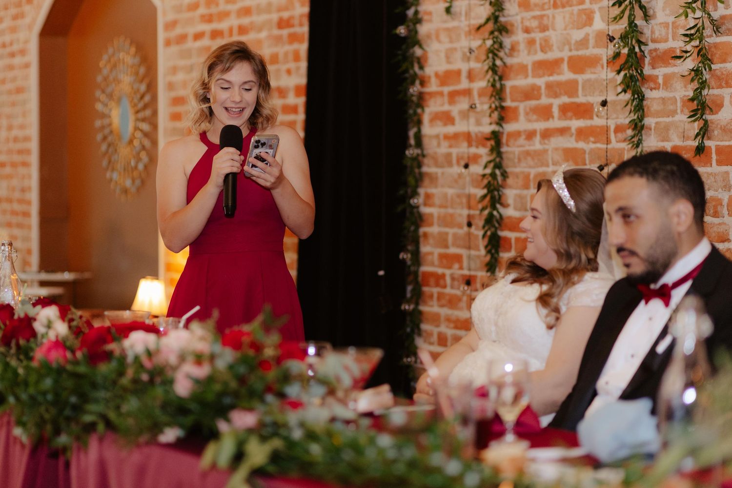 Elegant wedding reception at The 1206 in Crete, Nebraska, with glowing lights and joyful guests celebrating the newlyweds