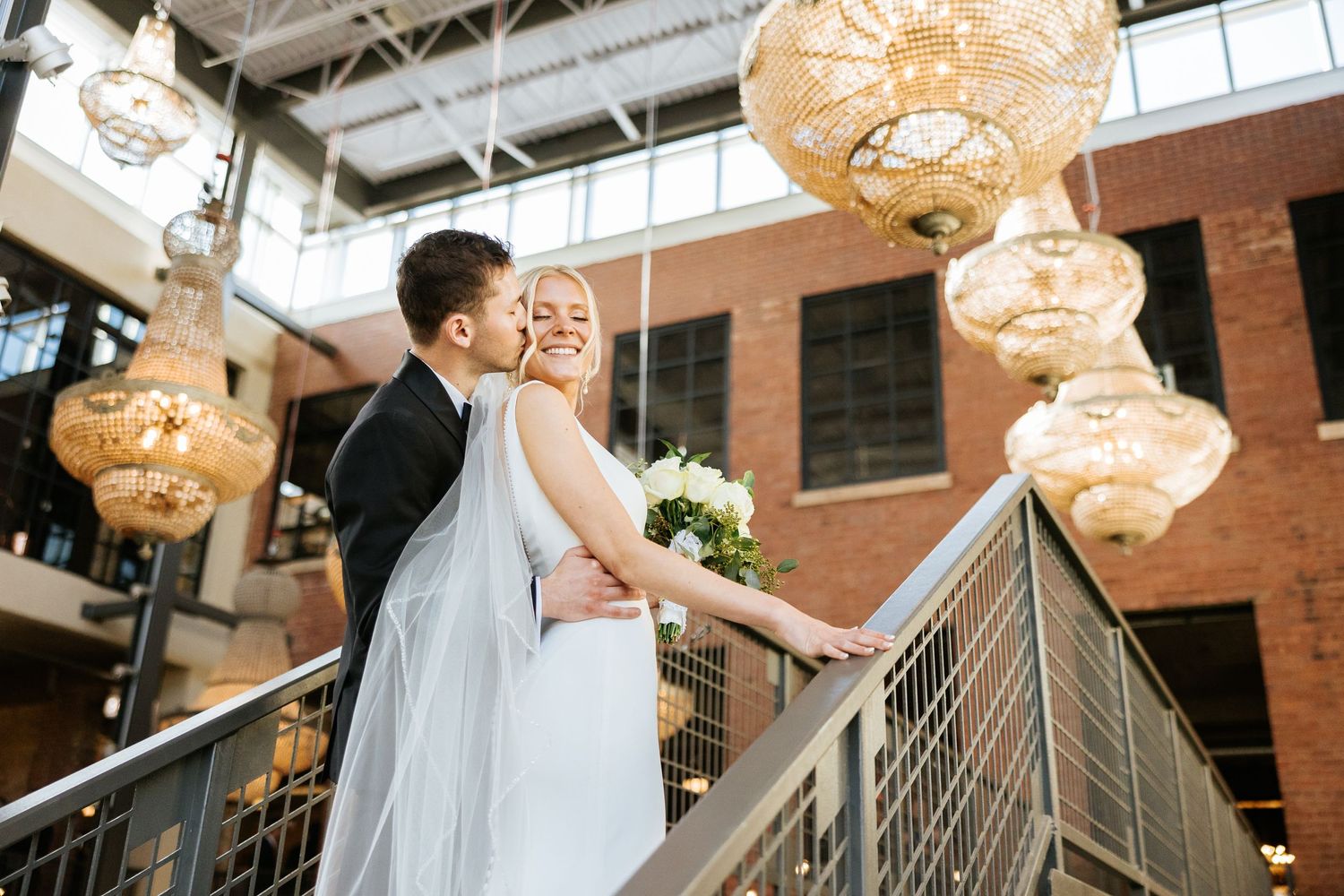 Minimalist bride and groom embrace at Artifact Events in Chicago