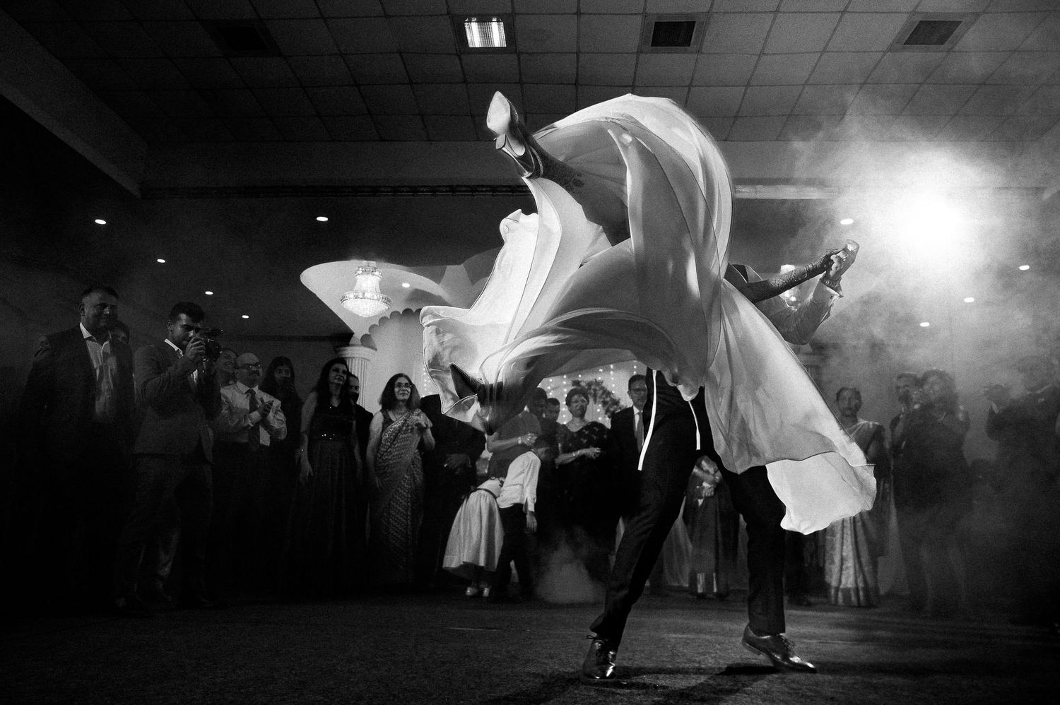 A dramatic image of a bride and groom dancing at the Villa Kasu, Bengaluru