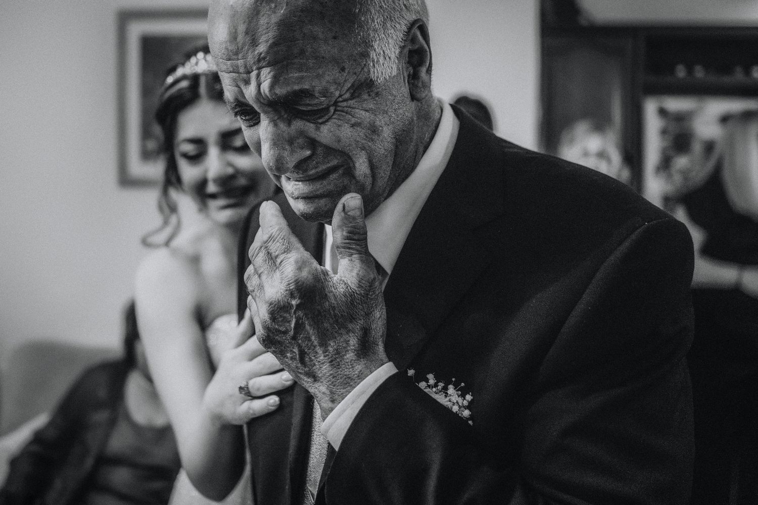 Candid black and white moments captured during a wedding celebration.