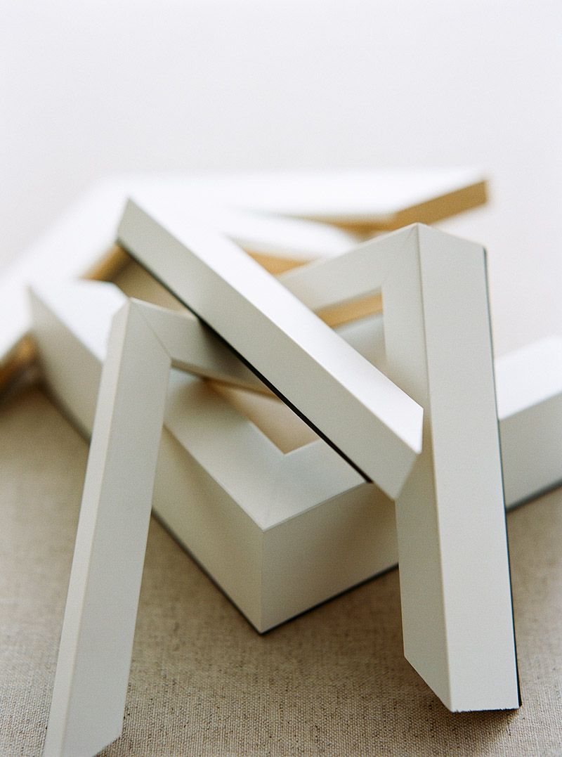 Detail shot of the Satin White frame, showcasing its sleek, glossy finish and clean lines.