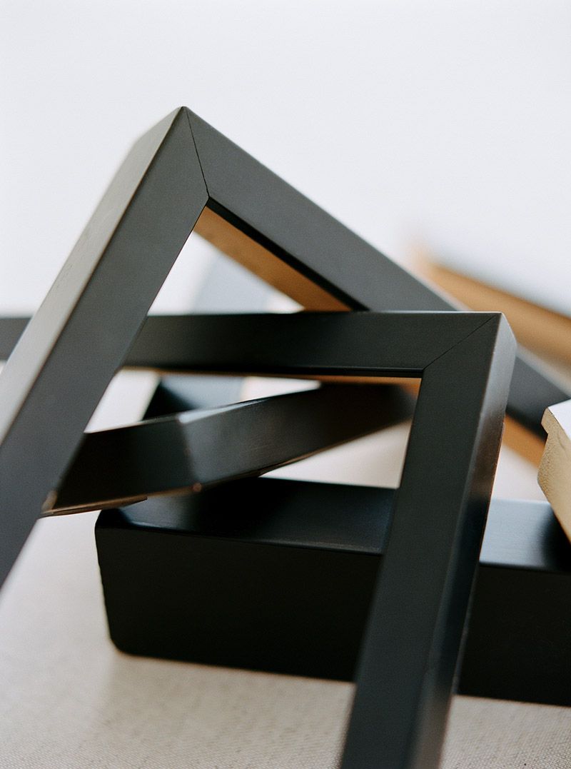 Detail shot of the Satin Black frame, showcasing its sleek, glossy finish and clean lines.