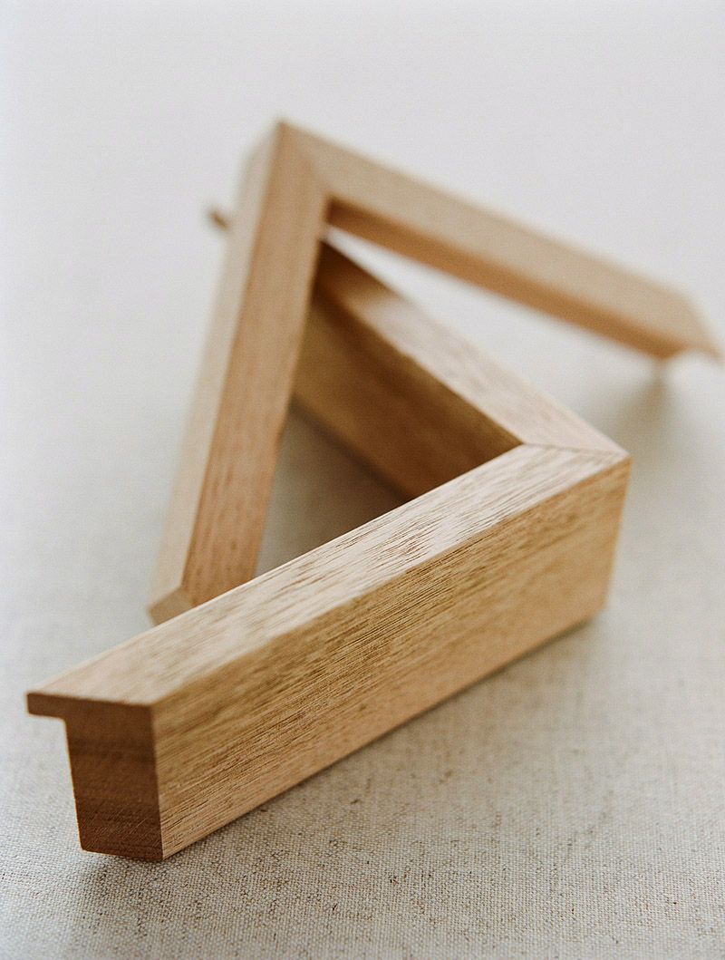 Close-up detail shots showcasing the Tasmanian Oak frames, highlighting their unique design and craftsmanship.