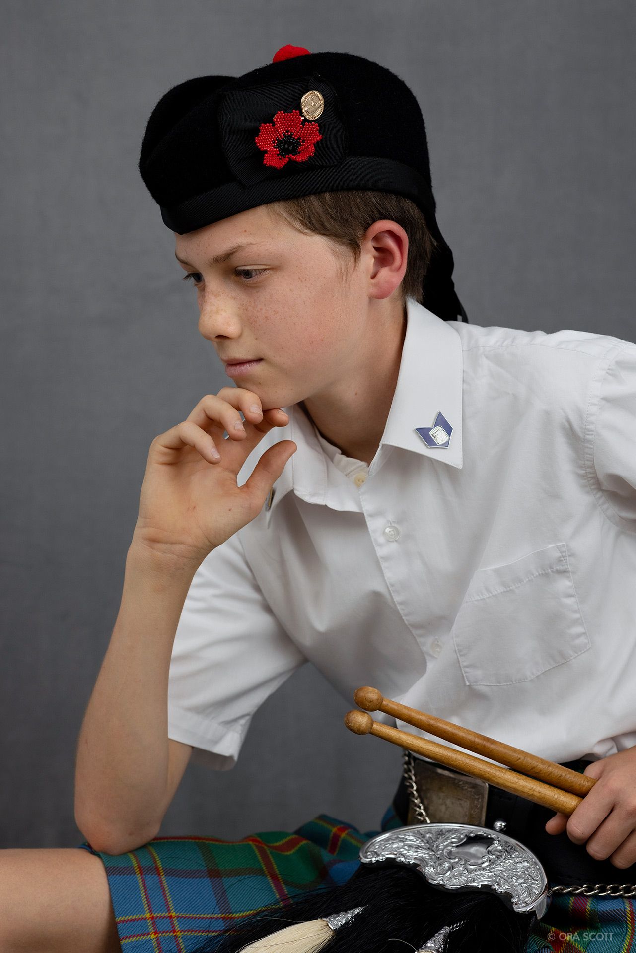cultural portrait with drummer who plays with bagpiper group on Maui