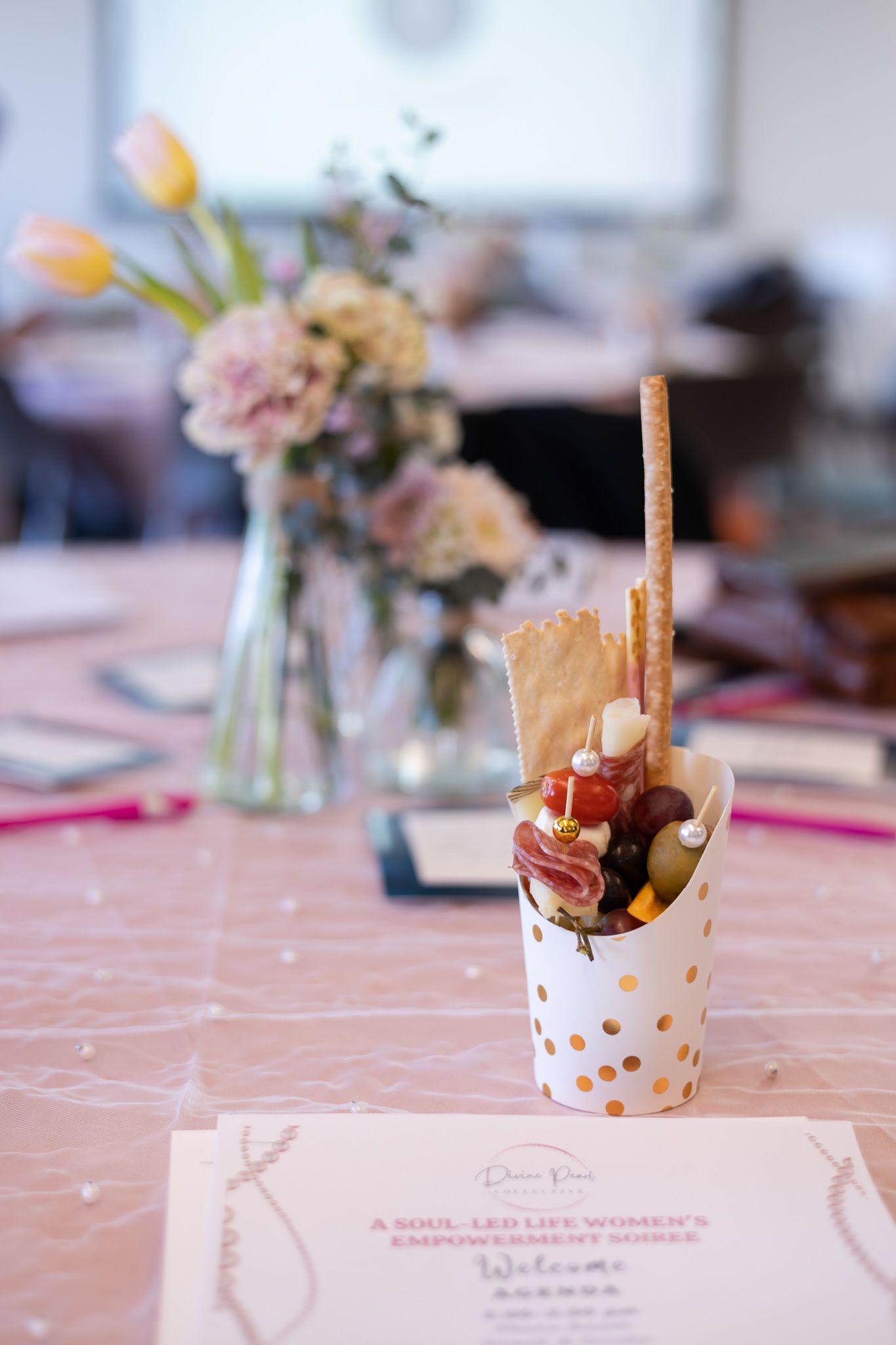 The Divine Pearl Collective women event photography in Edmonds, WA food on table at event