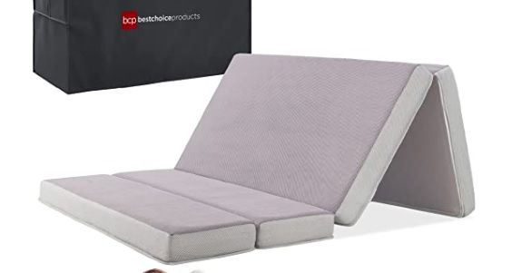 Foldable gray memory foam mattress displayed against white background.
