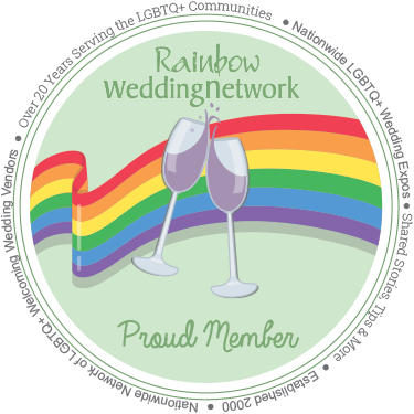 Rainbow Wedding Network badge with champagne glasses and rainbow design.