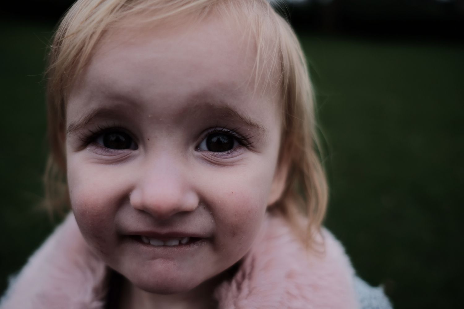Candid portrait of Tony's daughter getting up close and personal with the camera.