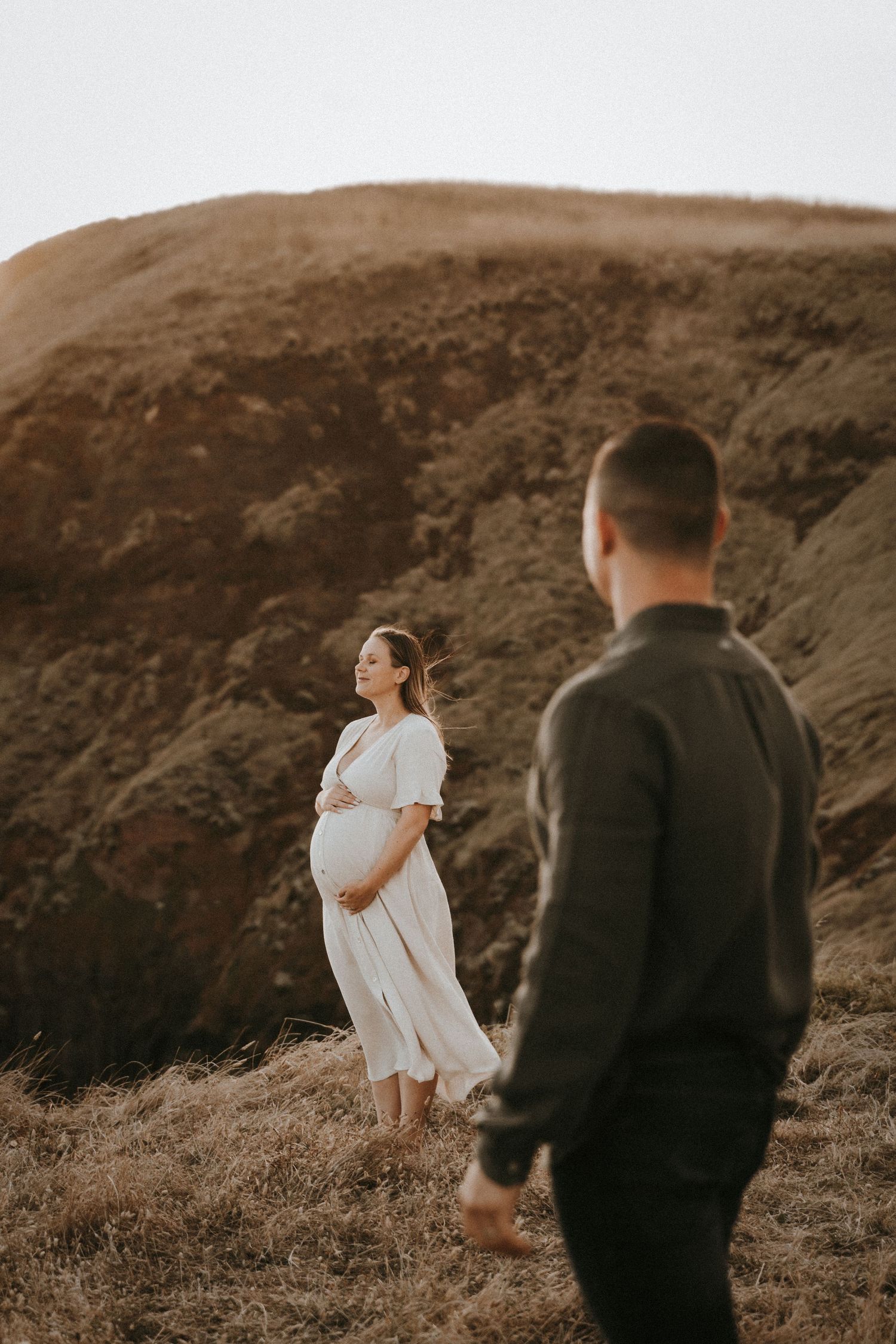 Outdoor sunset maternity session with two parents to be