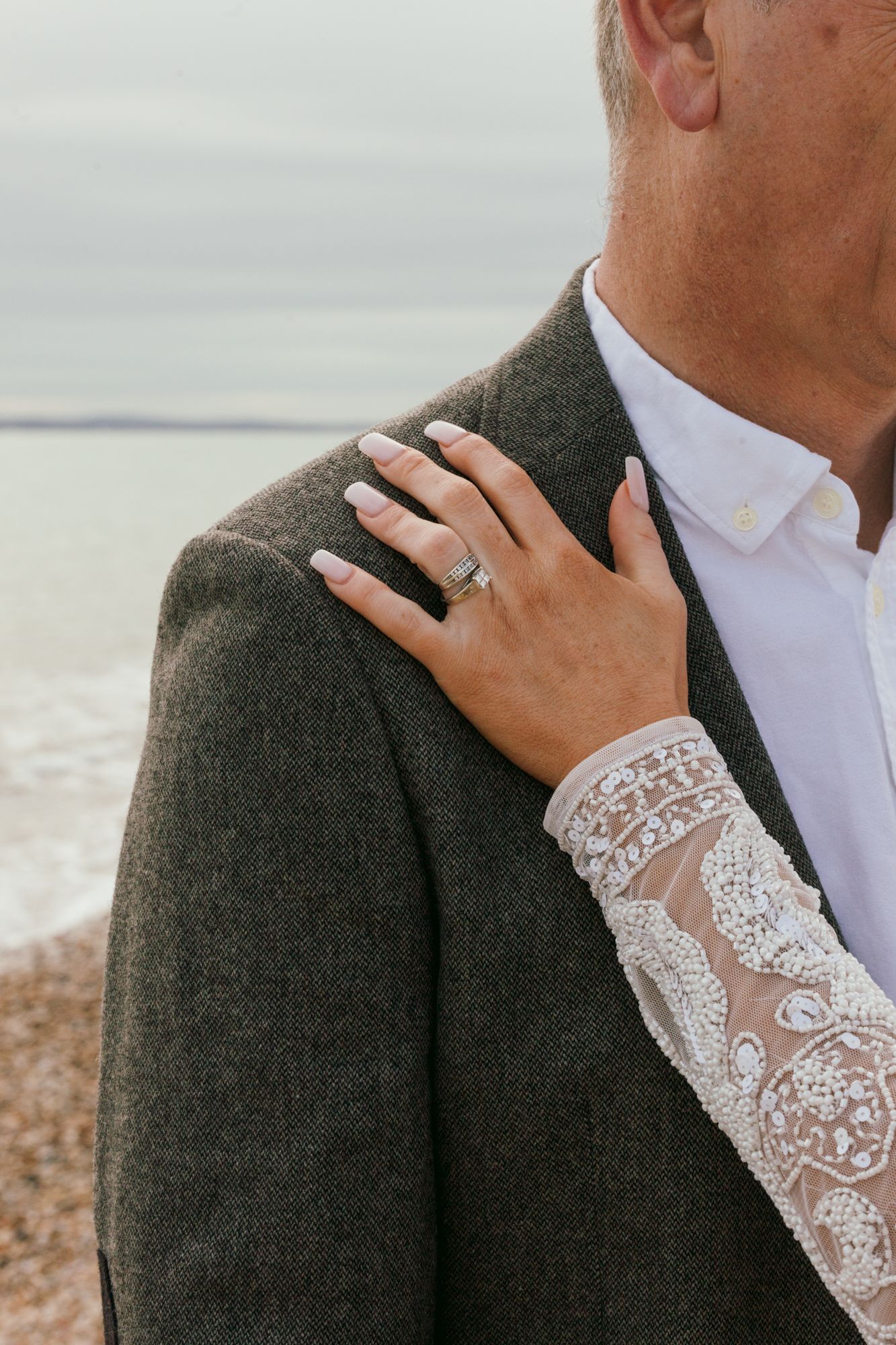 A romantic moment captured against the beautiful backdrop of Gosport during an engagement photoshoot.