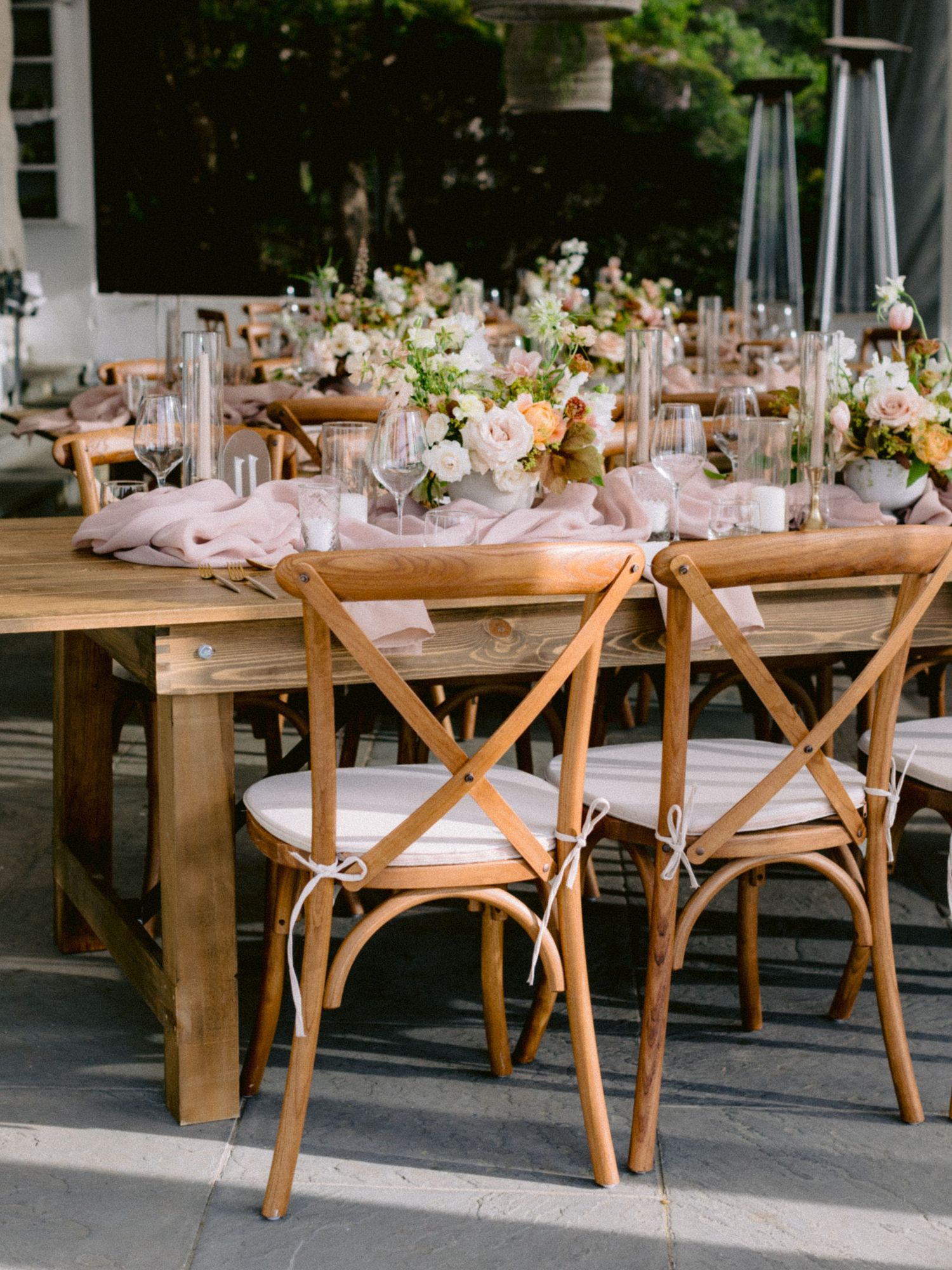 white and pink pastel wedding table set up