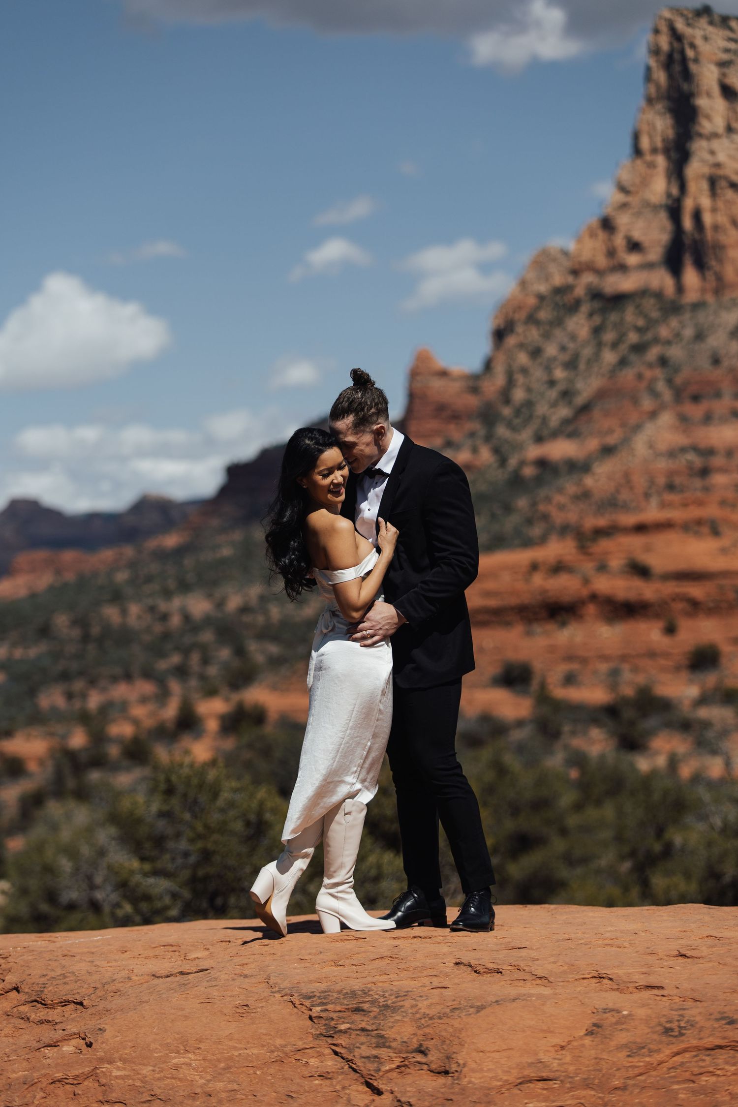 Wedding couple snuggles, Sedona Arizona