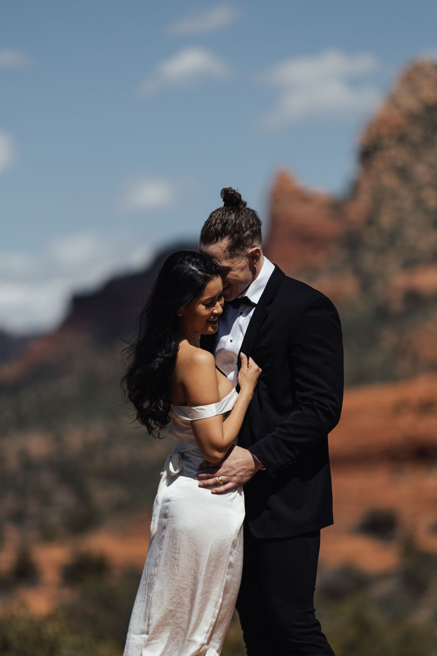 Wedding couple snuggles, Sedona Arizona