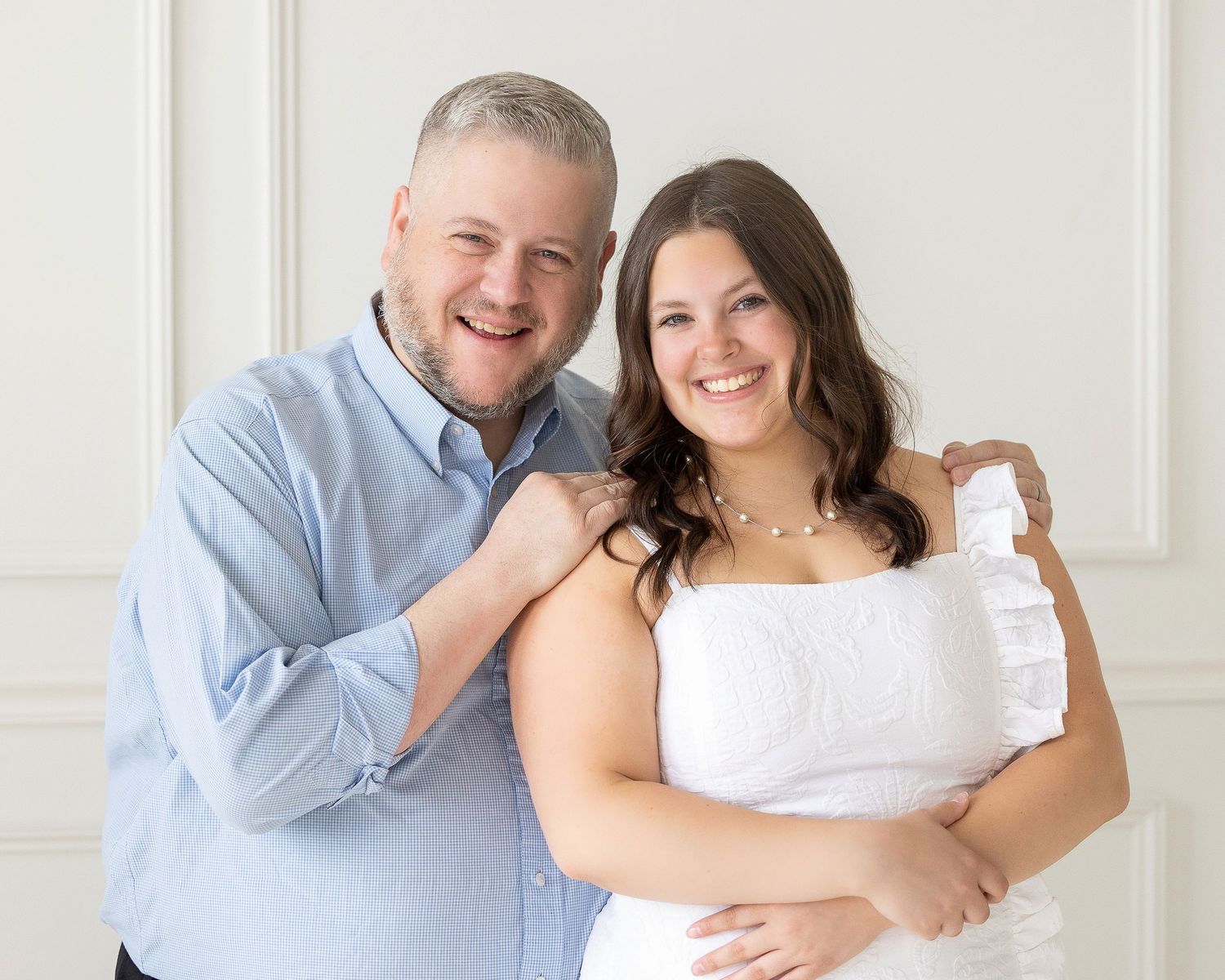 Father and daughter at senior photography session. Studio session. Beverly Hills, MI