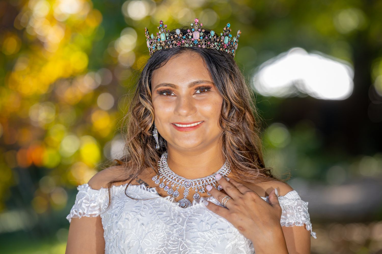 A stunning portrait of a beautiful woman radiating elegance and confidence. She is adorned in a gorgeous dress and exqui