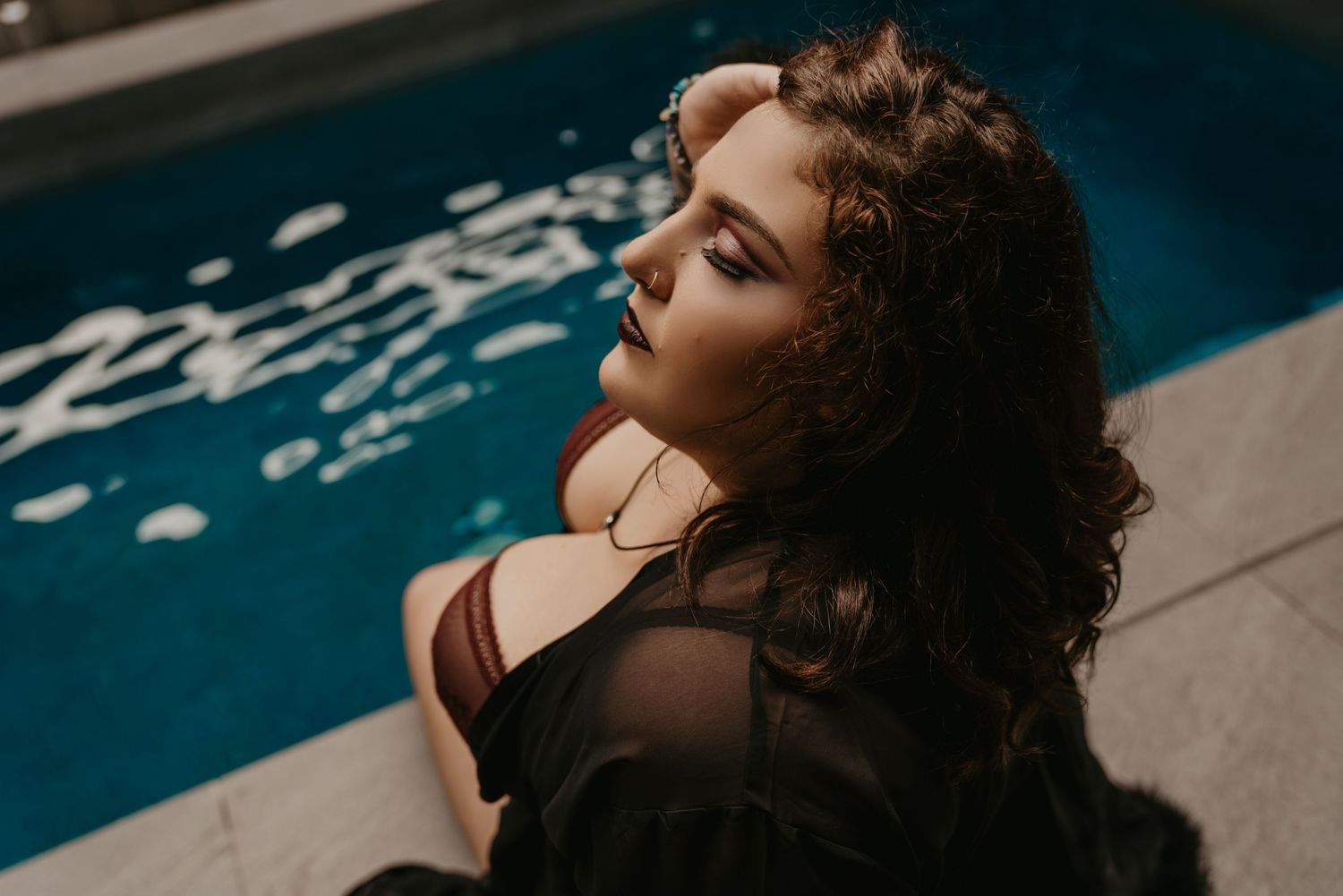 Boudoir Photography of Elegant Women Sitting by Pool