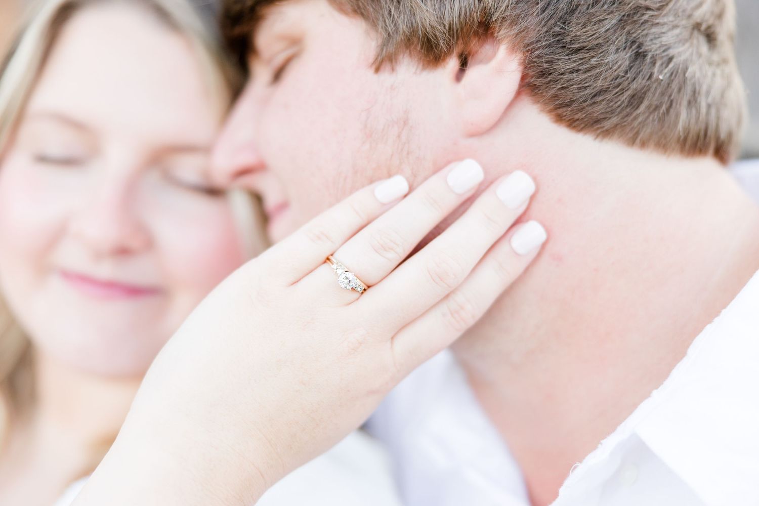 Artistic close-up series capturing gentle touches and expressions.