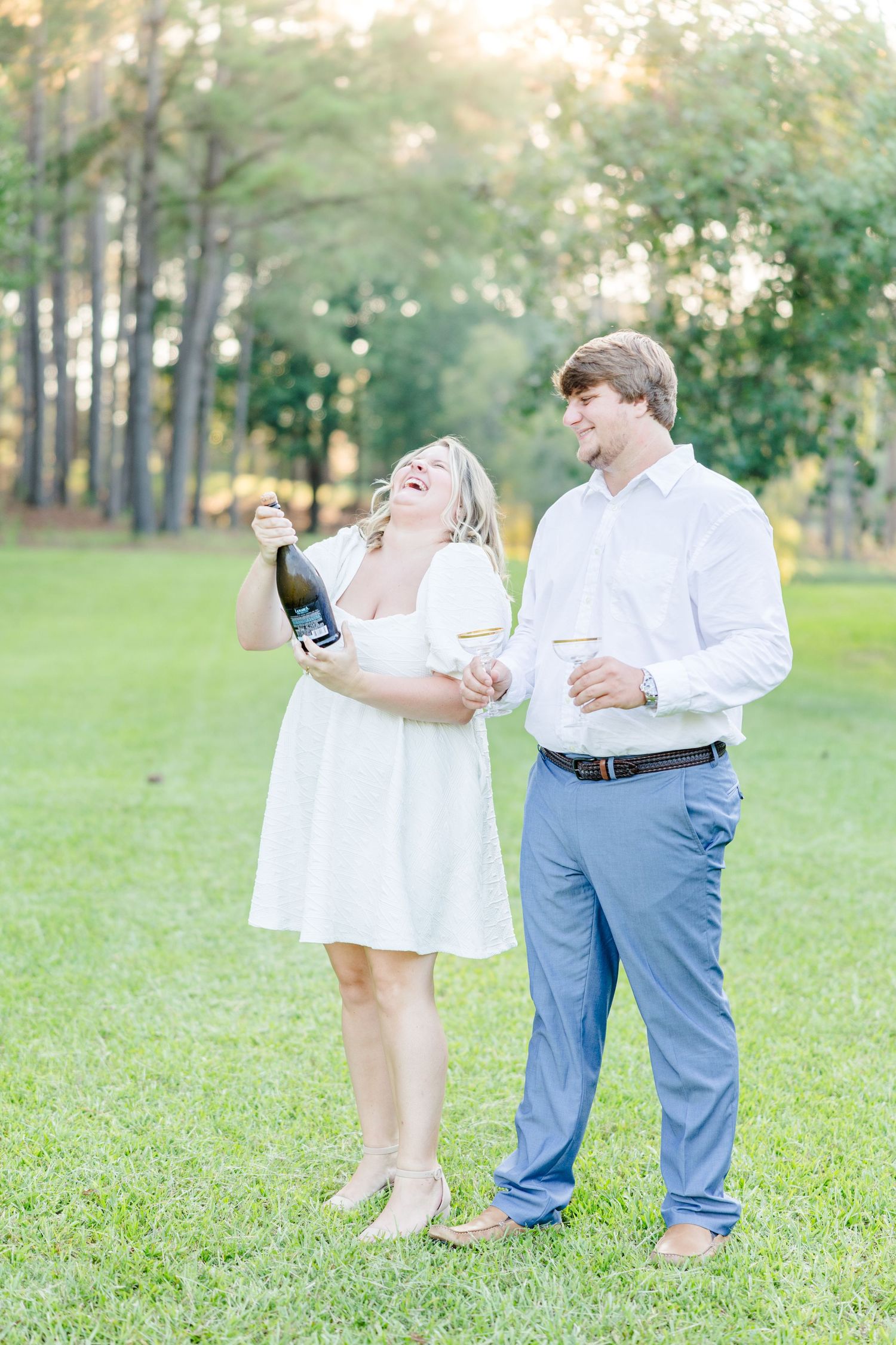 Fun champagne spray celebration captured in sequence outdoors.