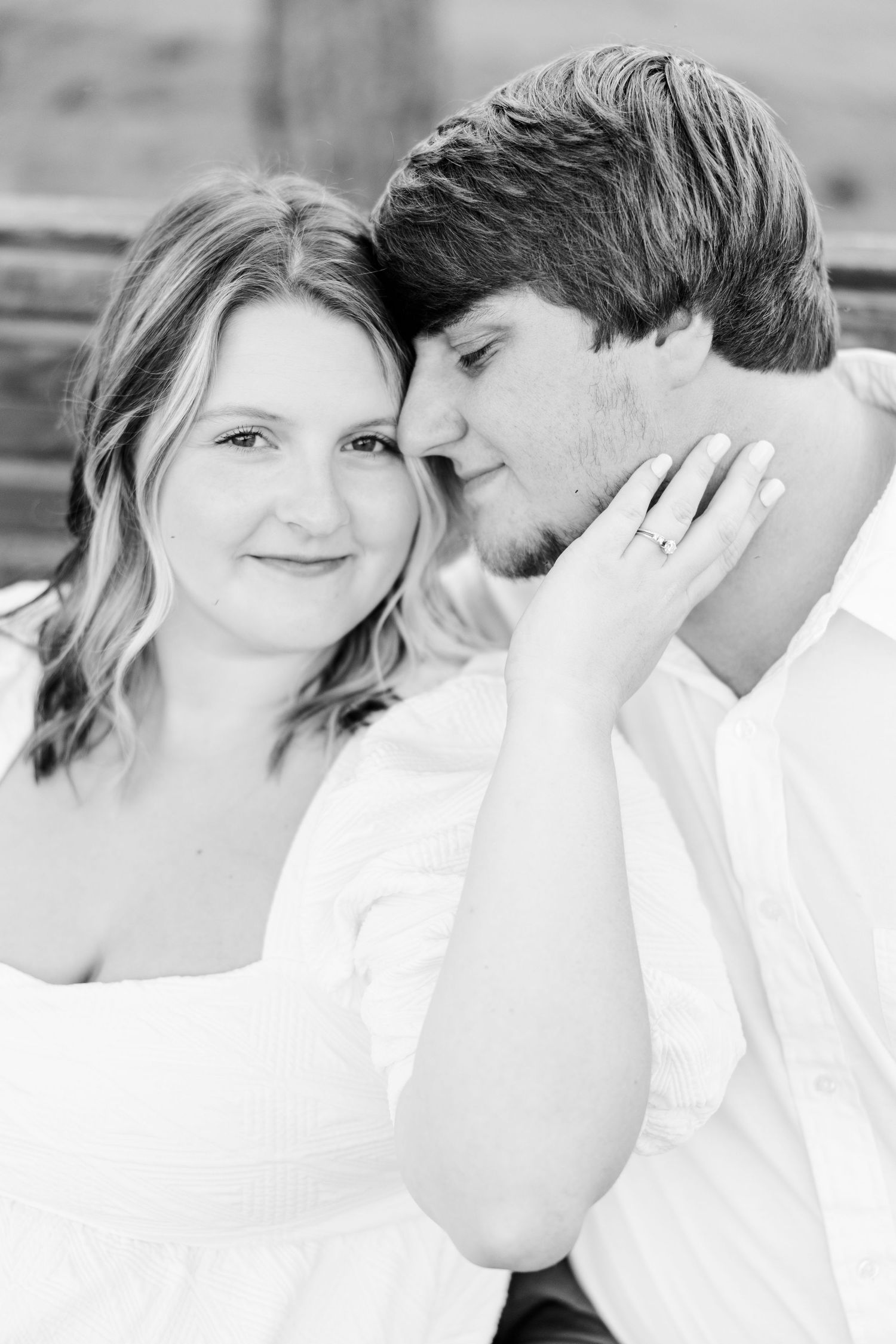 Close-up black and white series showing tender moments between a couple.