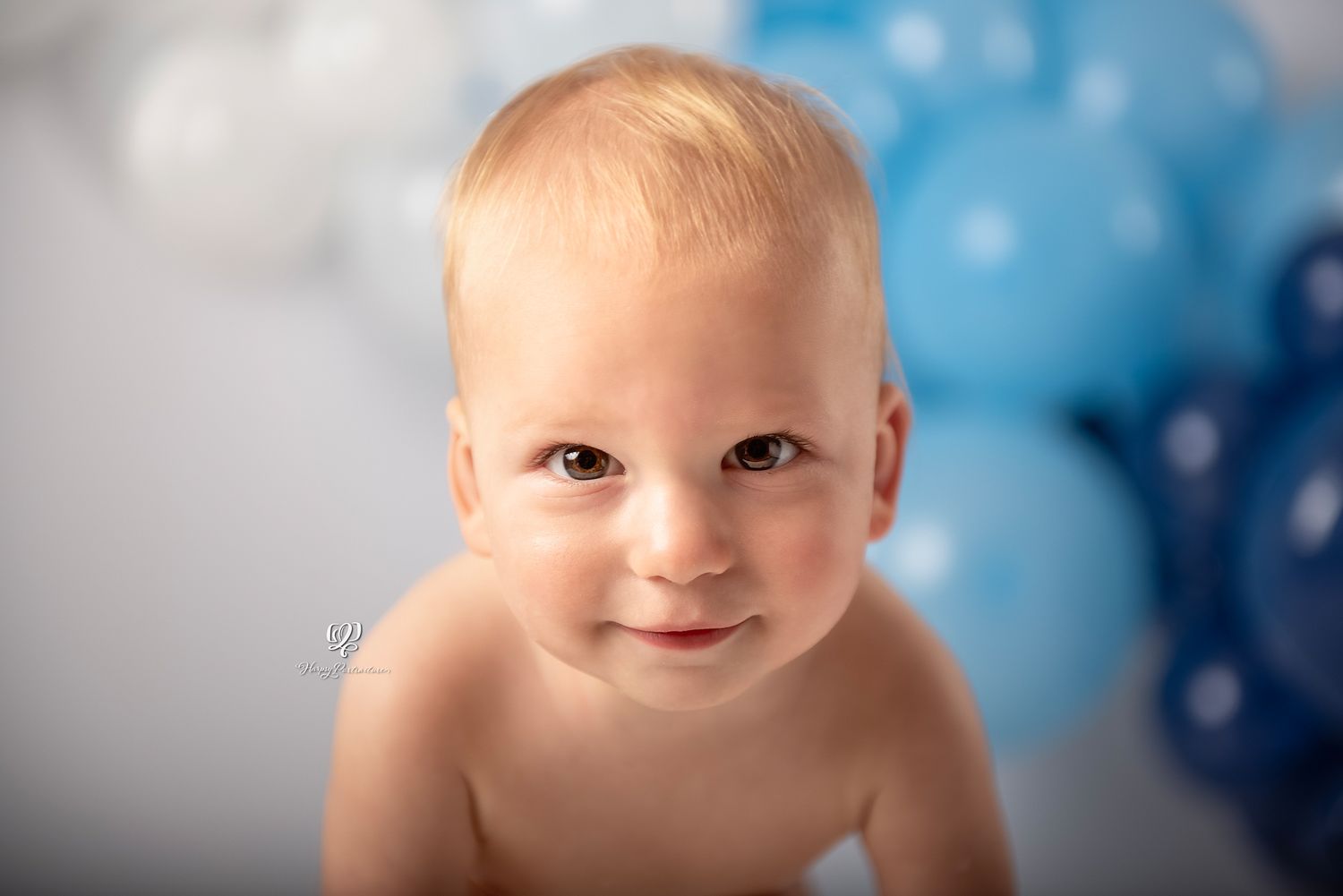 Baby boy birthday photoshoot; blue & white balloons birthday photo session; Lexington, SC Birthday photographer; Cake Sm